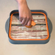 Illustration for article titled Which of these kitchen gadgets is best for makin’ bacon?